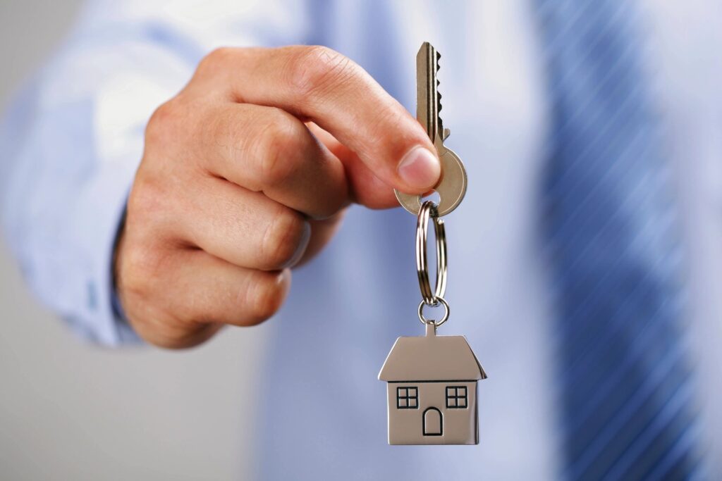 Man holding house keys
